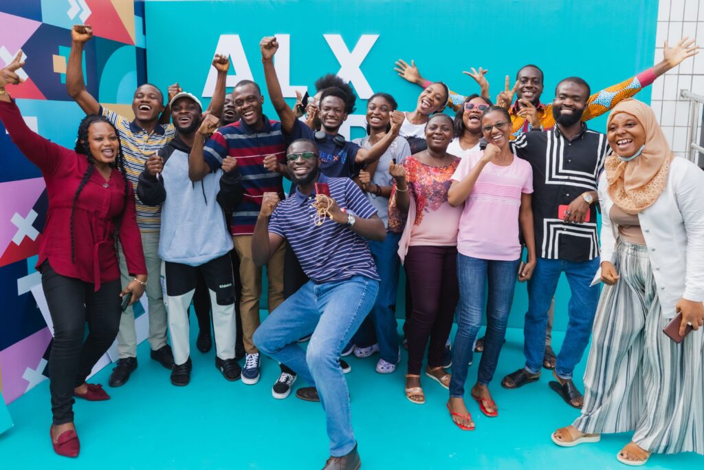 Several excited ALX learners posing for a picture at the Karibu ceremony in Accra