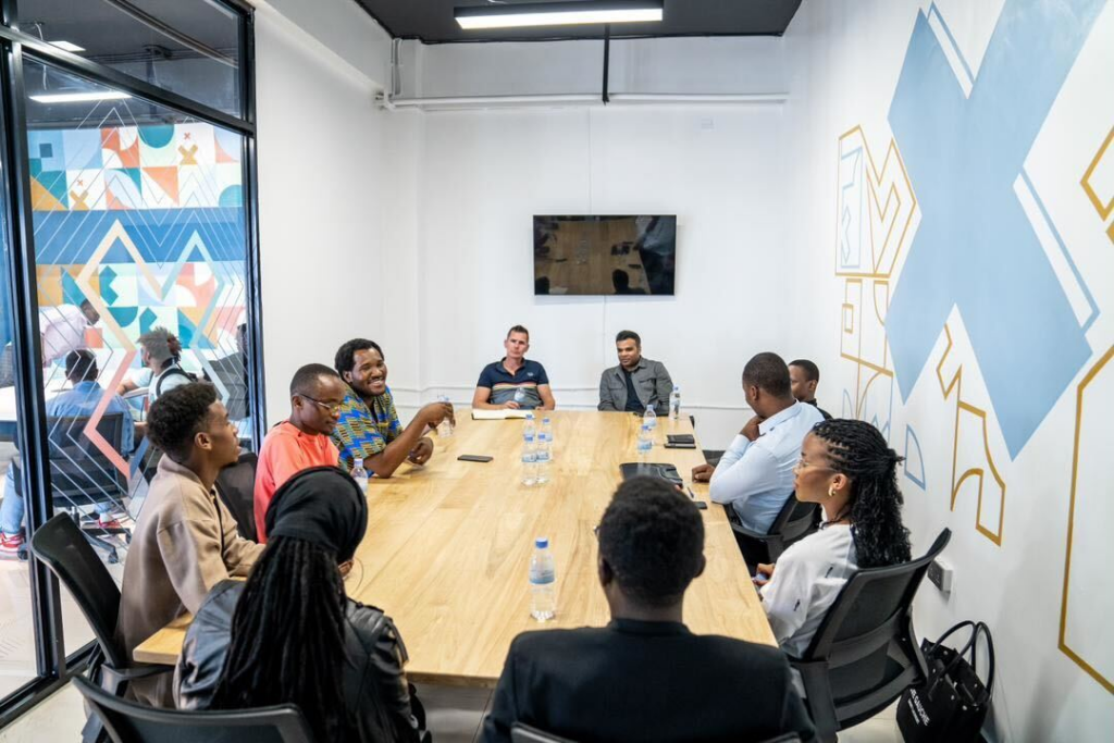 Guests in a roundtable discussion with ALX learners and fellows on the impact of ALX's learning model on them