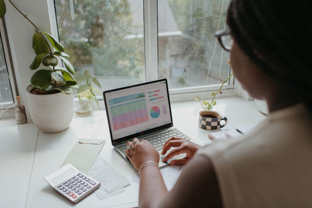 A person working on her laptop.