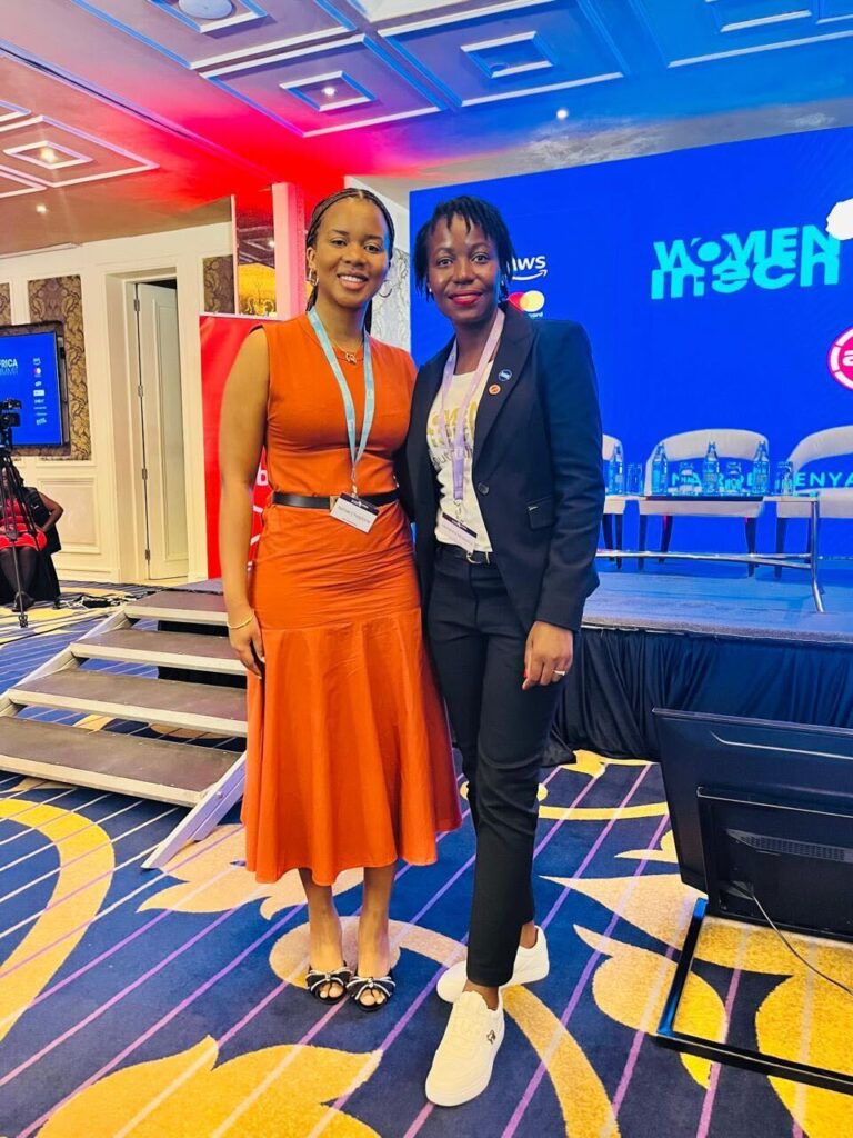 Photo of Nimie and another woman at the Women in Tech event.