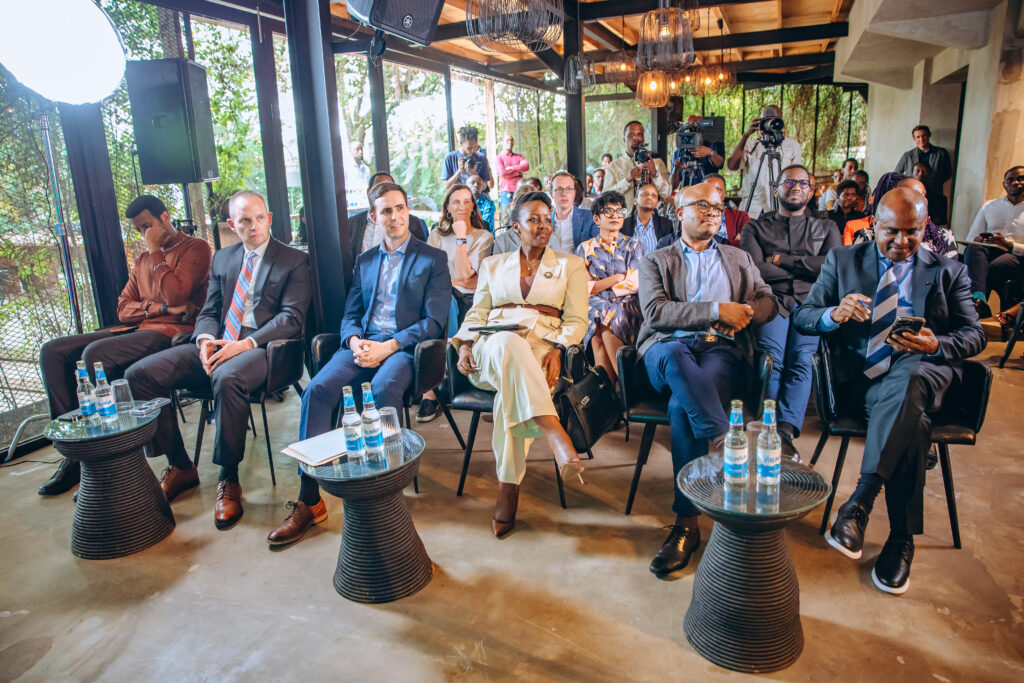 A photo of the attendees at the ALX x Anthropic event in Kigali, smiling during a presentation.